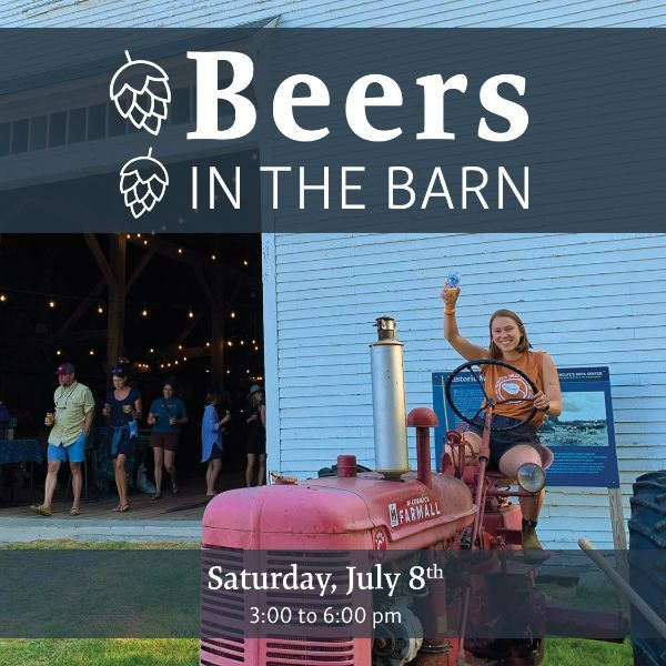 Woman holding a beer while riding an antique farming tractor. In the background, people are celebrating in a barn with beer.
