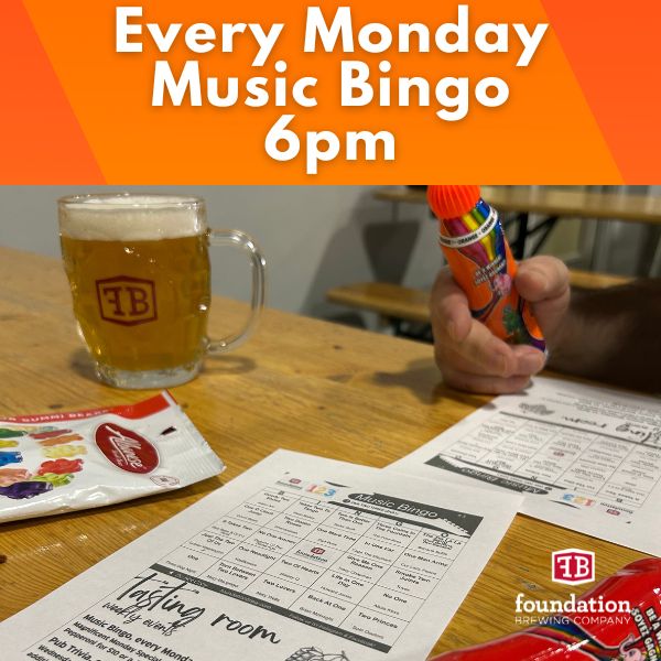 Guests playing Music Bingo in Foundation Brewing's tasting room on a Monday night